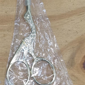 Tijera Retro Dorada